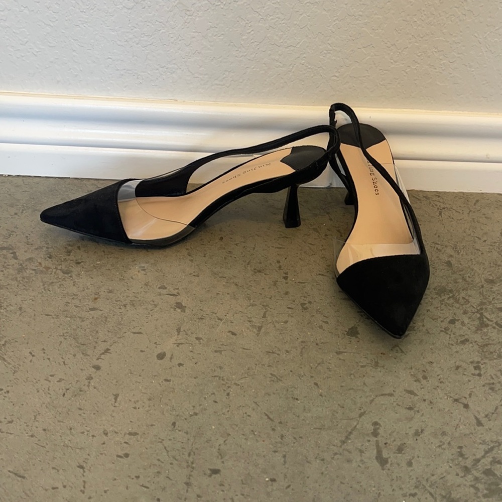 Black Swede point toe kitten heels.